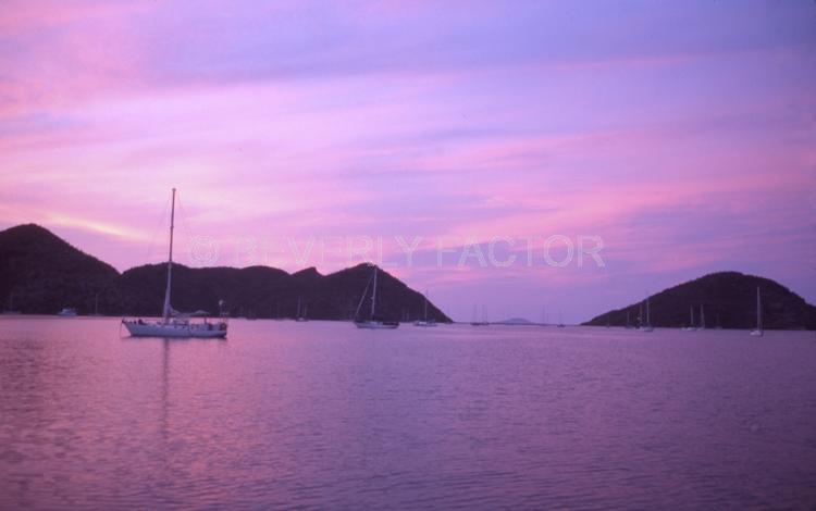 Sunset;colorful;sky;sea of cortez;clouds;water;boats;red;pink;sillouettes;sailboats;anchorages;ocean